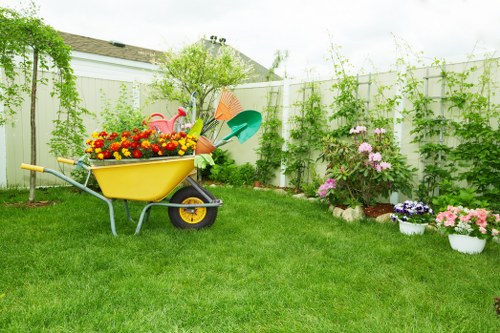 Workers separating garden waste for composting and chipping